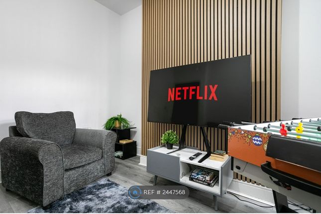 Living Room With Multi-Games Table