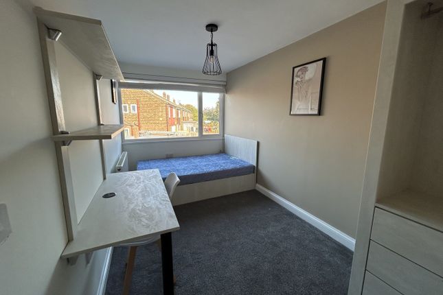 A Bright And Well-Organized Double Bedroom Featuri...