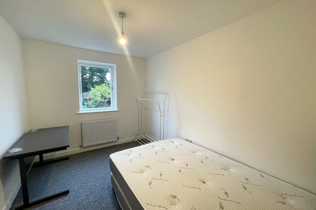 This Inviting Double Bedroom Features A Spacious l...