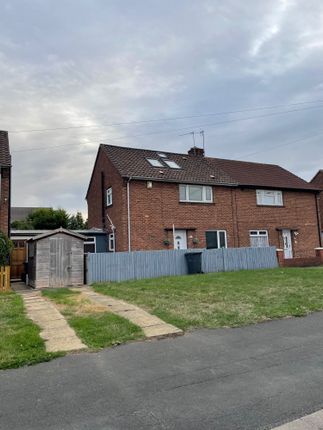 A Charming Semi-Detached Brick House With A Neat F...