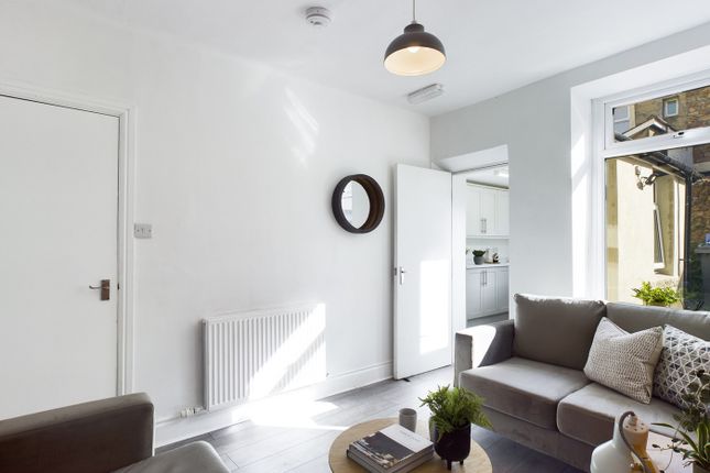 A Bright And Inviting Large Modern Living Room, Pe...