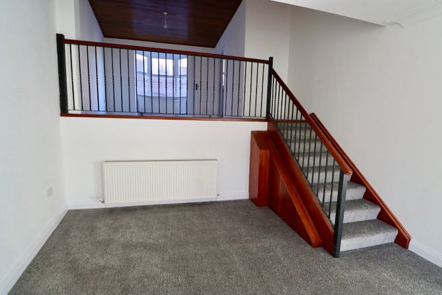 Living Room Stairs Leading To Dining Room