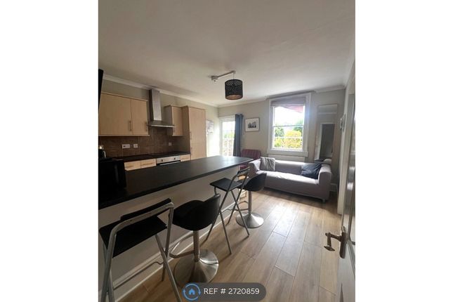 Open Plan Living Room Opens Onto The Garden