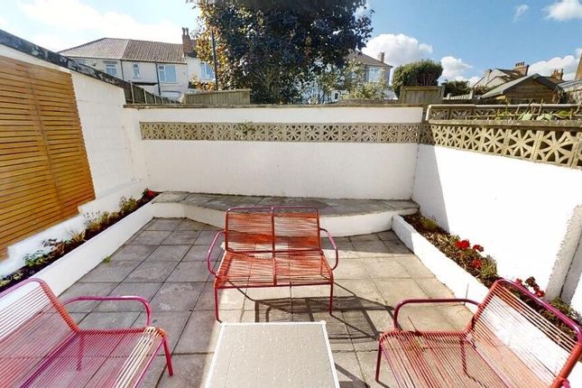 Bright And Inviting Private Garden Patio Featuring...