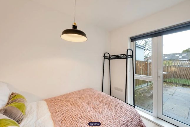A Bright And Inviting Double Bedroom Featuring Mod...