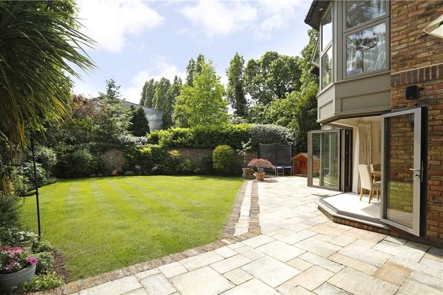 Detached house to rent in Eversley Park, London SW19
