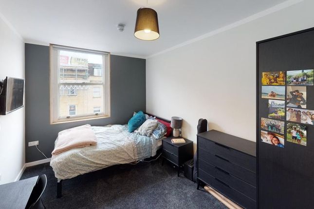 A Bright And Inviting Double Bedroom Featuring A c...