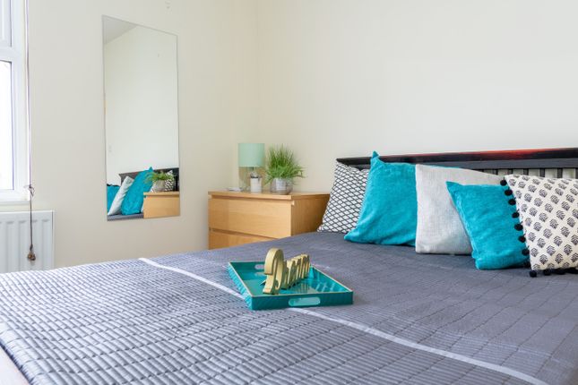 A Beautifully Arranged Double Bedroom Featuring A ...