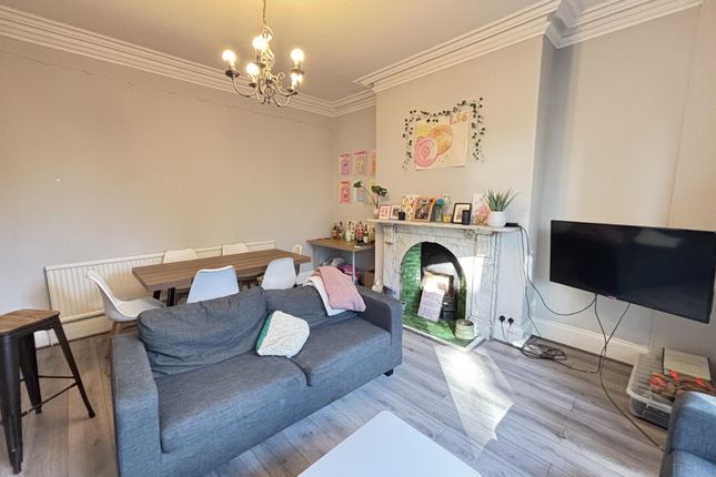 A Bright And Welcoming Living Room With Contempora...