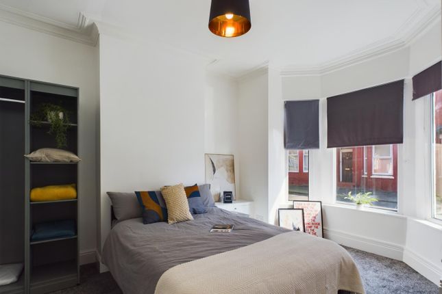 A Bright And Inviting Double Bedroom With Stylish ...
