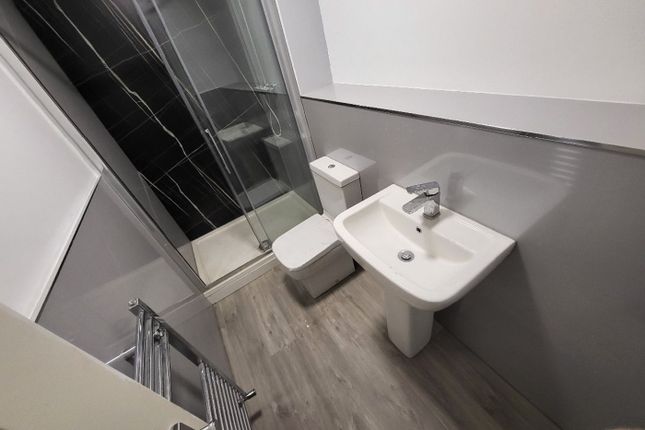 A Modern Bathroom Featuring A Sleek Design With A ...