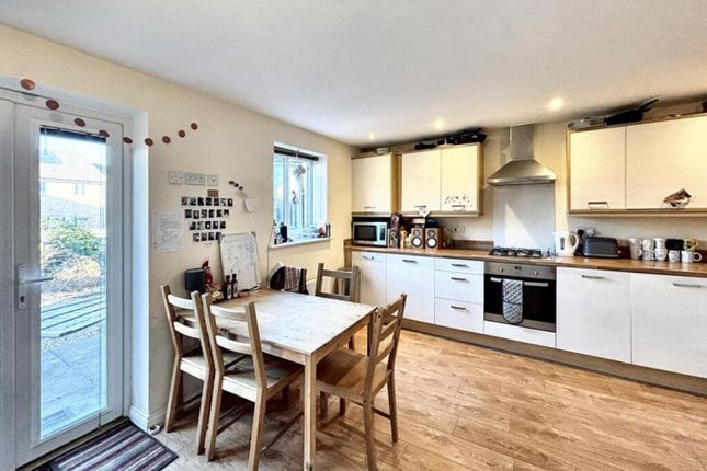 Spacious And Modern Kitchen Featuring Ample Counte...