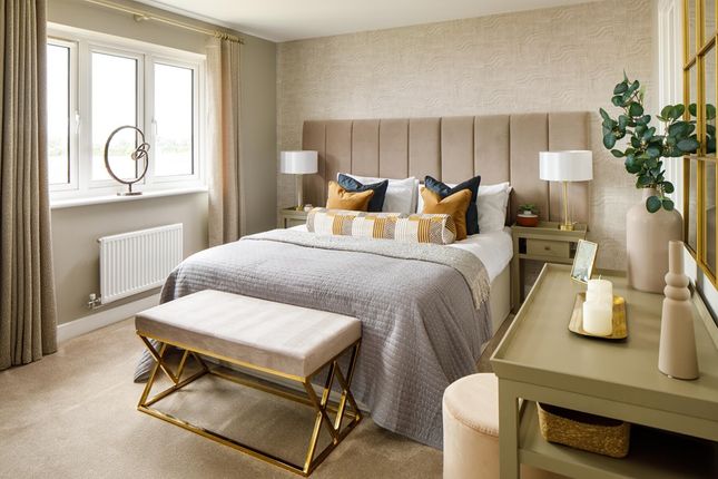 Large Windows Fill The Main Bedroom With Light