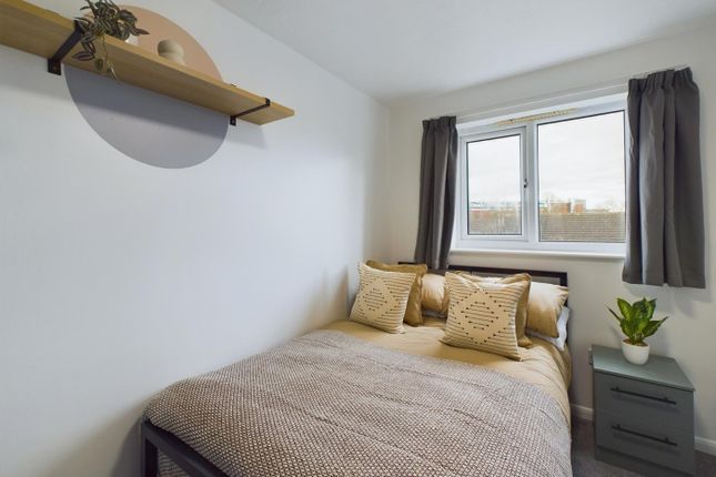 A Cozy And Well-Lit Double Bedroom Featuring Moder...