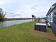 Thumbnail Detached bungalow for sale in North East Riverbank, Potter Heigham