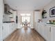 The Kitchen Leads To A Dining Area, Leading Through Double Doors To The Garden