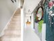 The Hallway Is Welcoming And Includes Under Stairs Storage