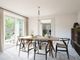 Family-Friendly Dining Area With French Doors To Garden