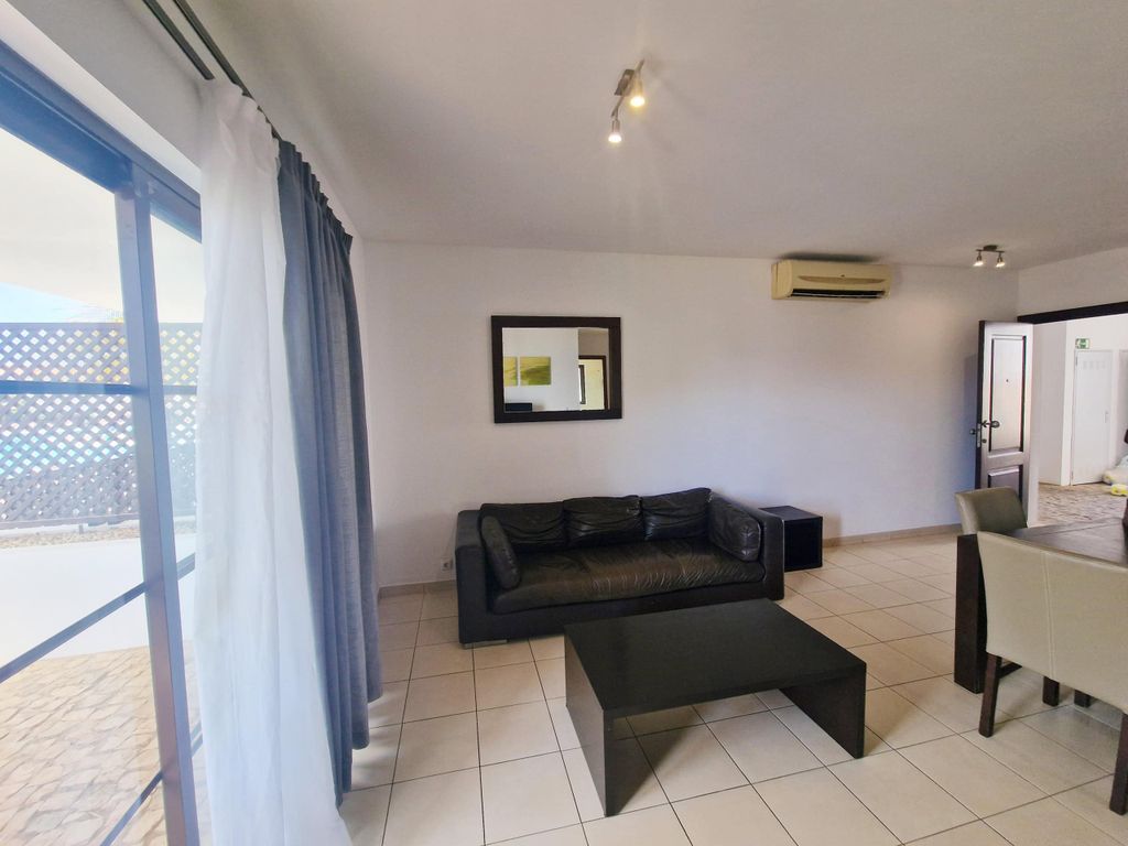 Property photo 2 of 11 Living Area