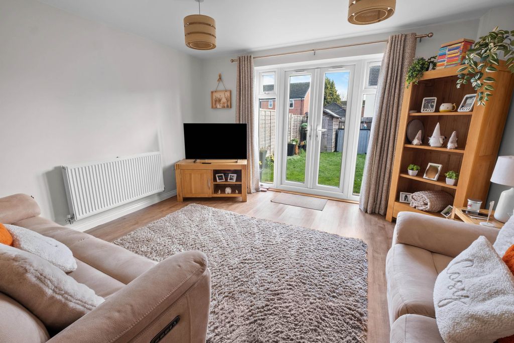 Property photo 2 of 15 Living Area