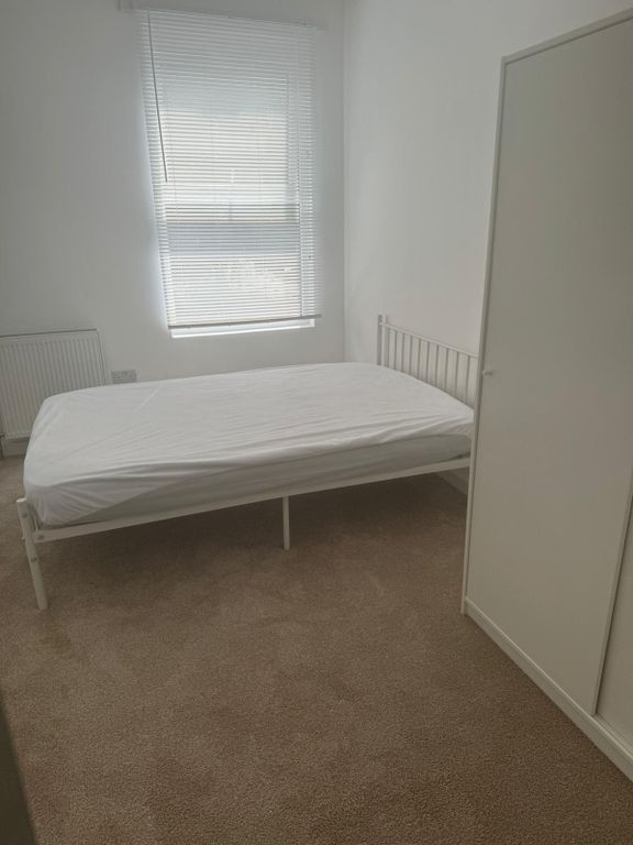 Property photo 3 of 7 A Simple And Clean Double Bedroom Featuring A Whit...