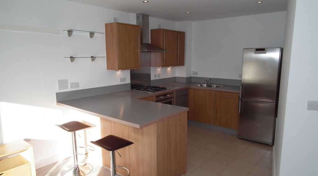 Property photo 3 of 12 Kitchen