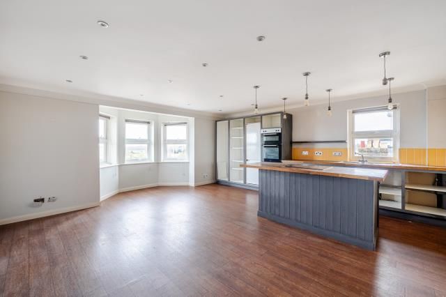 Property photo 3 of 7 Kitchen Living Room