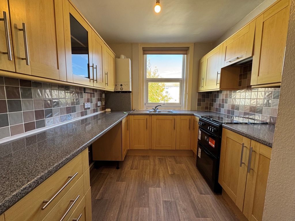 Property photo 3 of 9 Kitchen