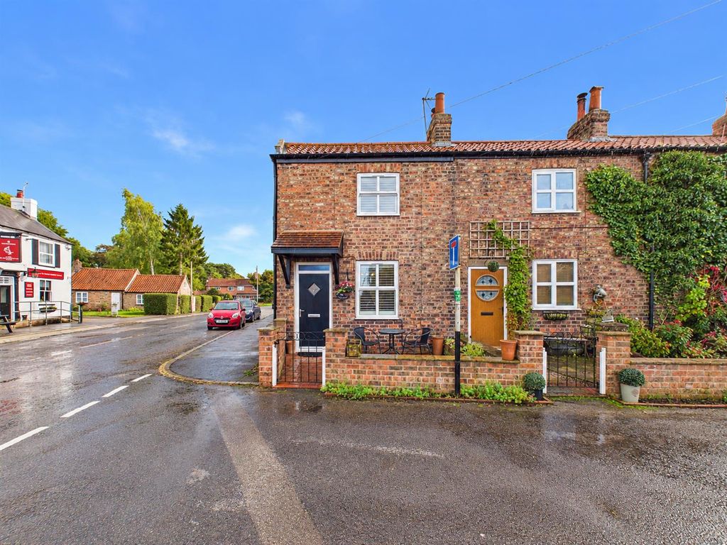 Property photo 1 of 17 Rain-Glossed Village Terrace Corner.Png