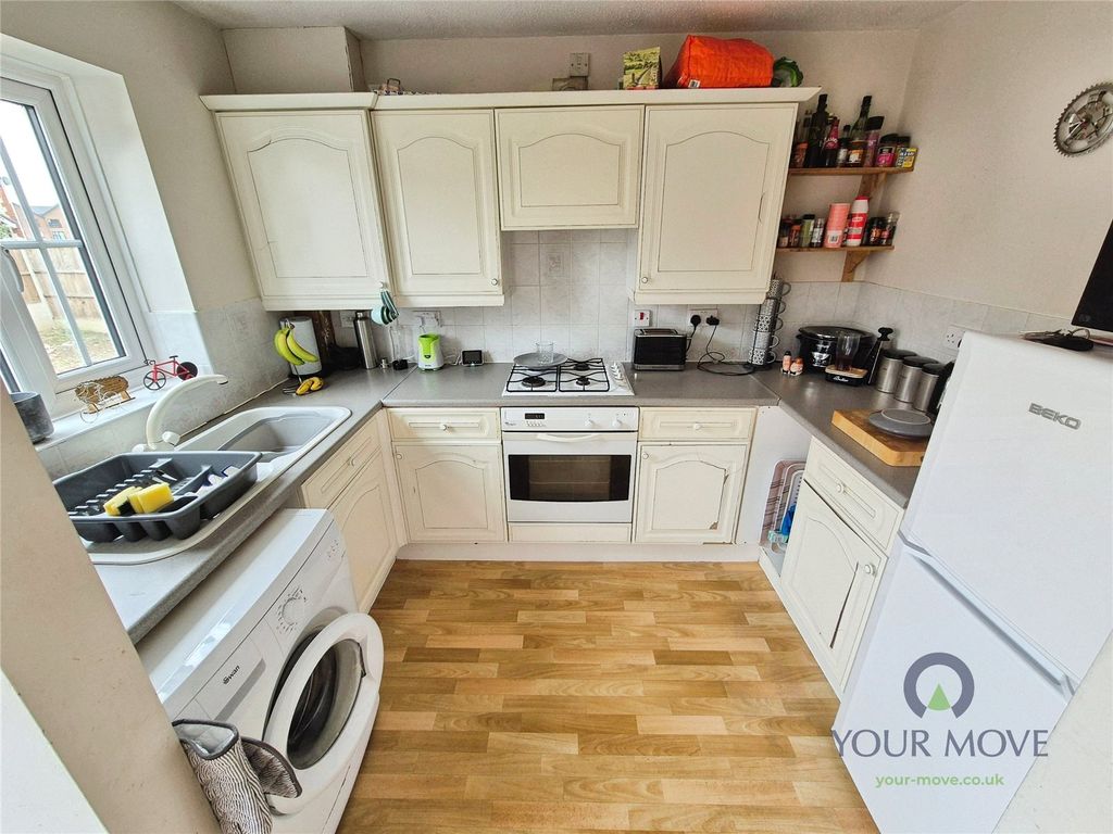 Property photo 2 of 11 Kitchen Area
