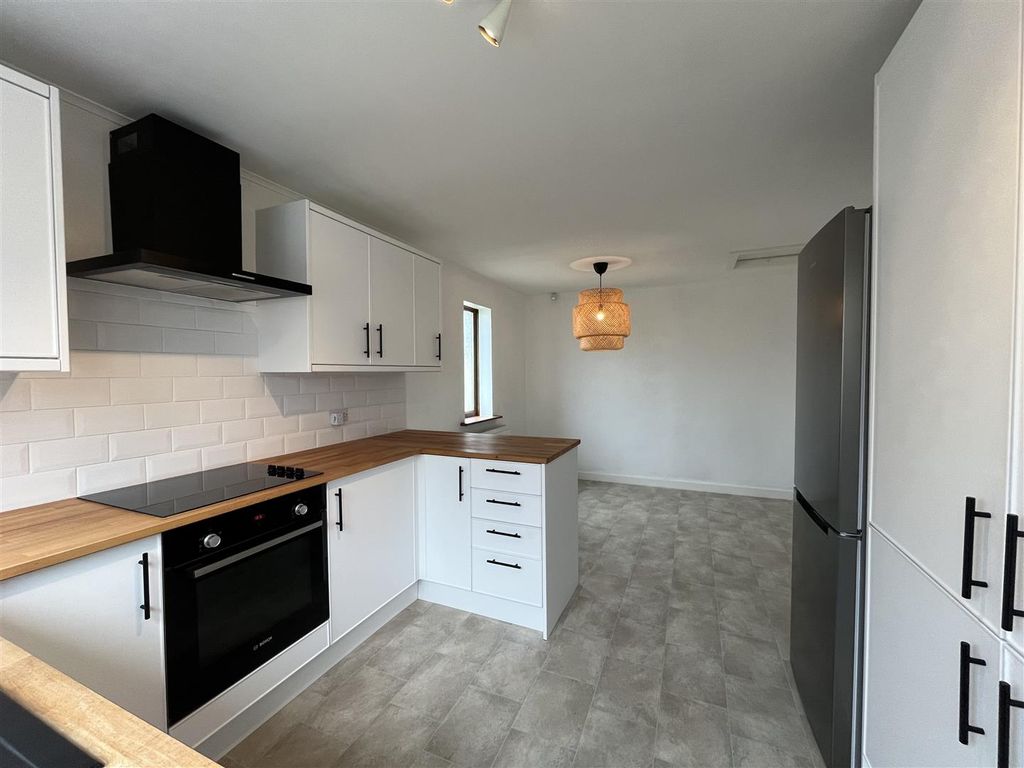 Property photo 3 of 14 Dining Kitchen