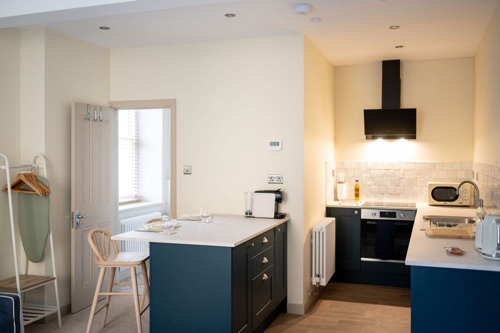 Property photo 2 of 11 Kitchen Area