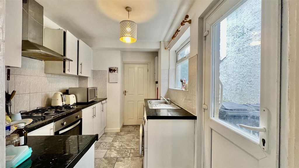 Property photo 3 of 13 Kitchen