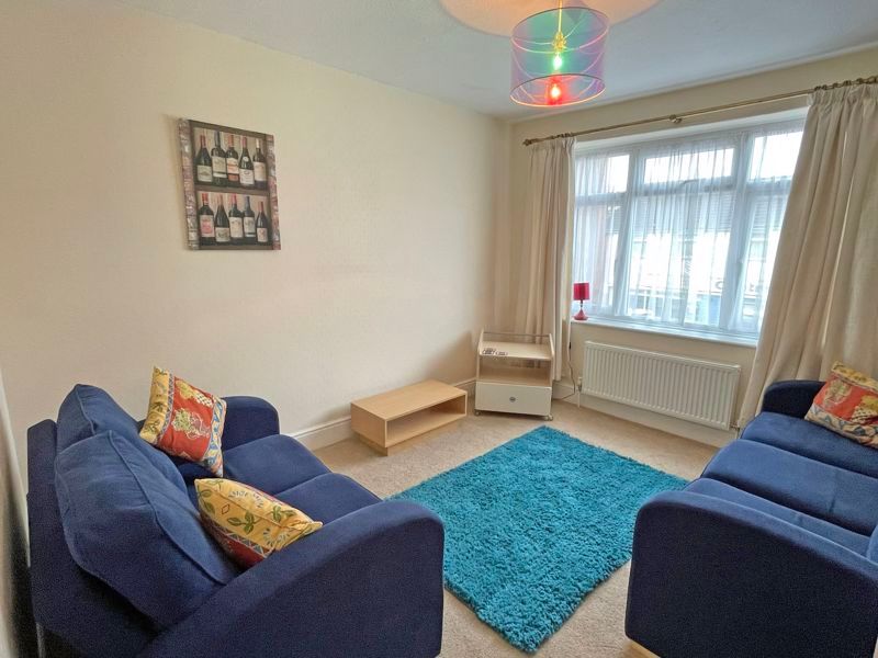 Property photo 3 of 8 Sitting Room