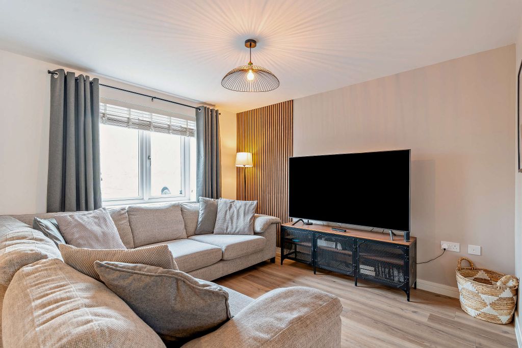 Property photo 2 of 13 Living Area