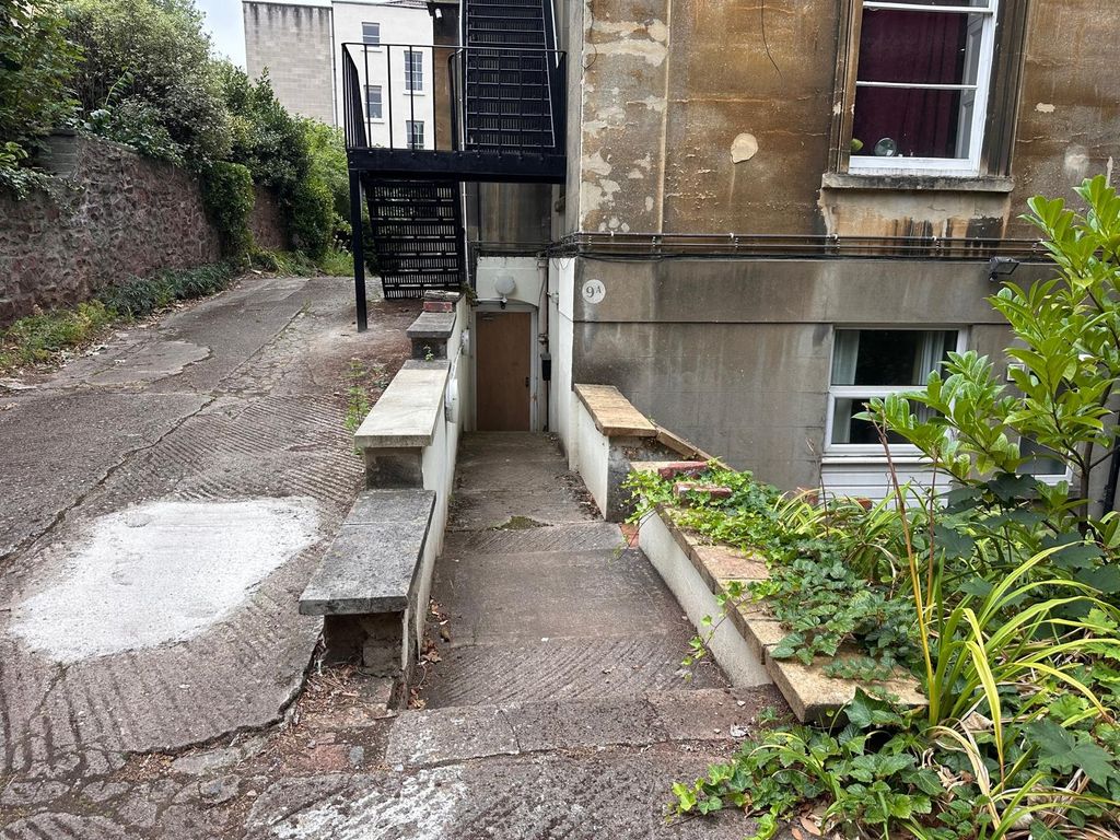 Property photo 3 of 13 Stone Path And Steps Leading Down To A Lower-Level...