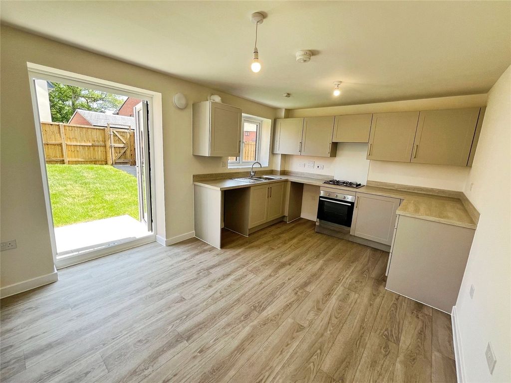 Property photo 2 of 14 Dining Kitchen