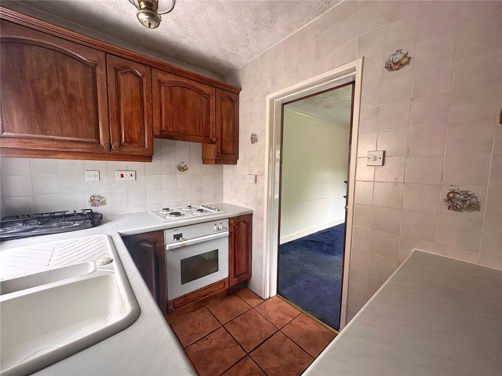 Property photo 3 of 12 Kitchen