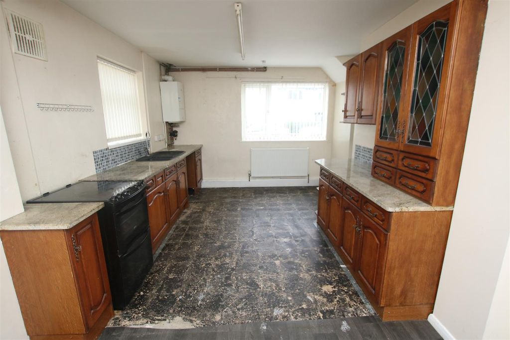 Property photo 3 of 13 Dining Kitchen