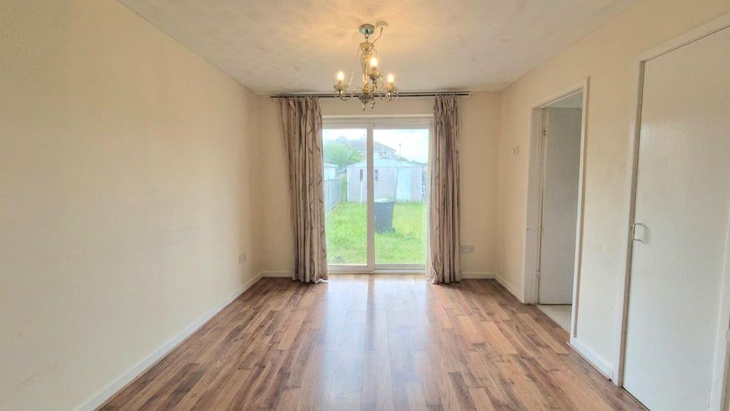 Property photo 3 of 15 Family Room/Dining Area