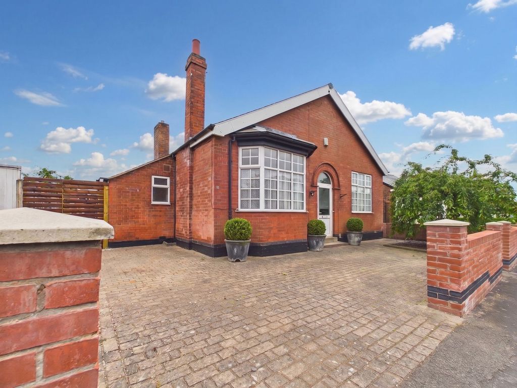 Property photo 1 of 19 Front (Digitally Enhanced)