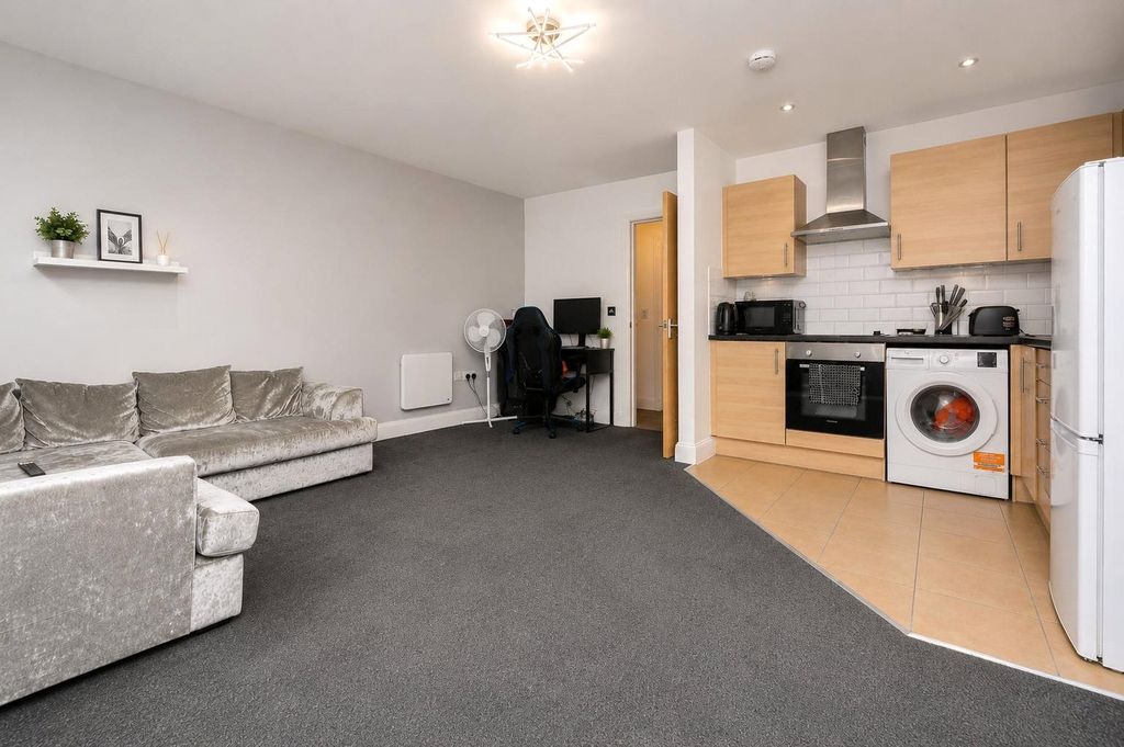 Property photo 2 of 8 Living