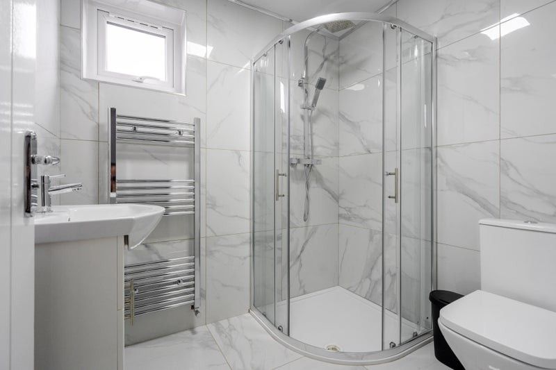 Property photo 1 of 9 This Modern Bathroom Features A Sleek Design With ...