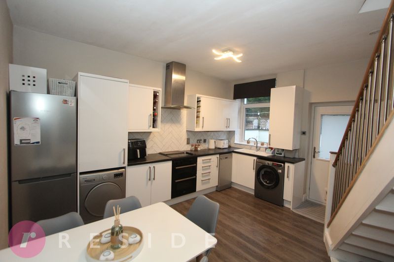 Property photo 3 of 13 Dining Kitchen