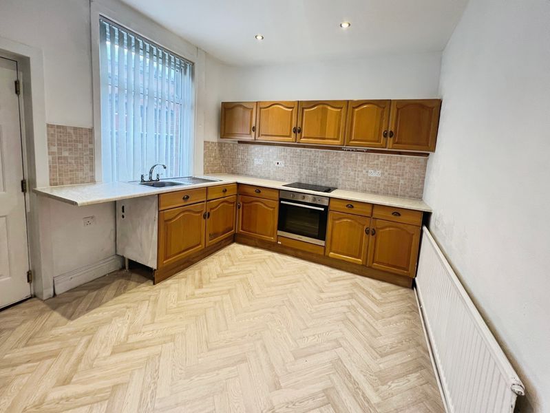 Property photo 3 of 13 Kitchen