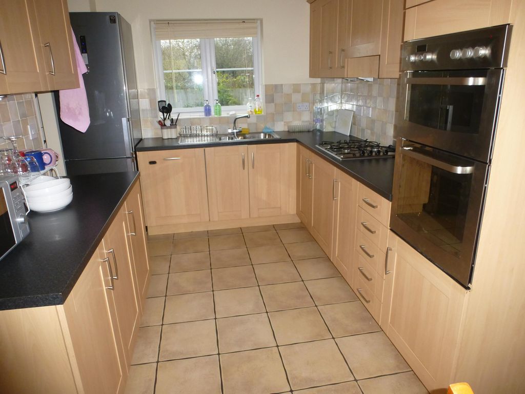 Property photo 2 of 12 Kitchen