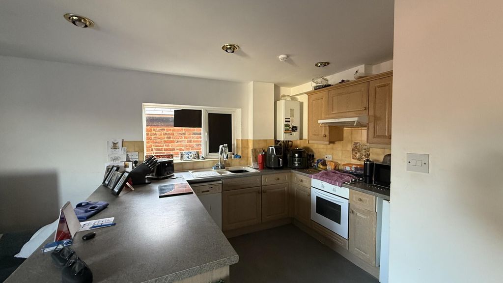 Property photo 3 of 12 Kitchen