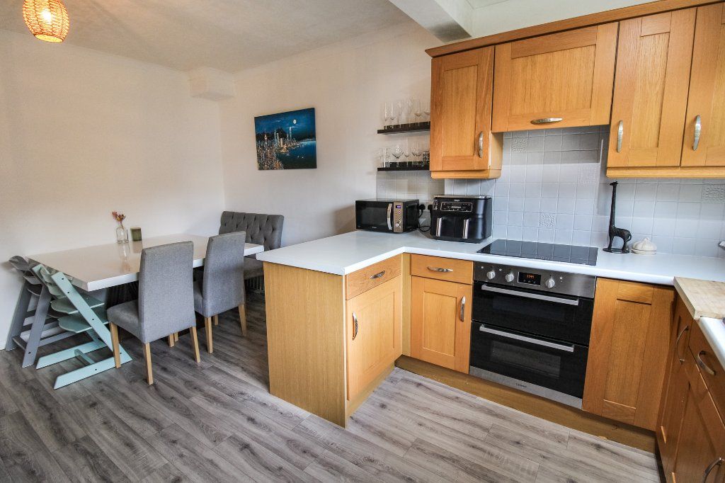 Property photo 3 of 18 Dining Kitchen