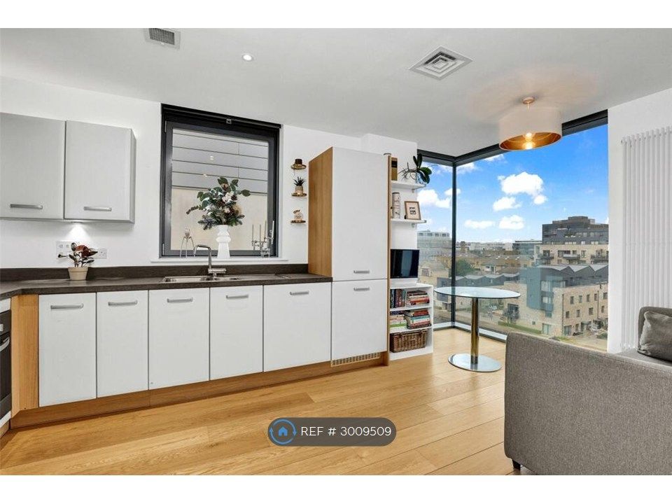 Property photo 1 of 11 Kitchen/Open Living Room