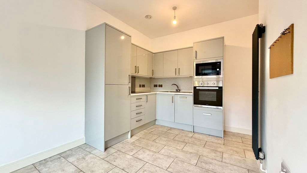 Property photo 2 of 11 Kitchen/Dining Area